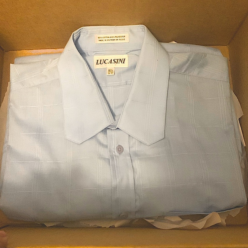 Im Selling a button-up shirt- Size: 36 - 37 / 16 1/2- 60% Cotton/ 40% Polyester